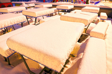 Snow-covered attractions in the old park