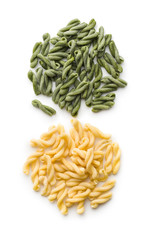 Uncooked spinach gemelli pasta.