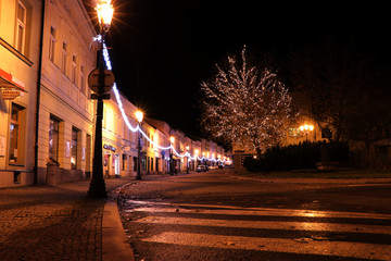 A beautiful street which is decorated to christmas. Christmas tree, christmas chain. All is back in the city