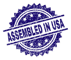 ASSEMBLED IN USA stamp seal watermark with distress style. Blue vector rubber print of ASSEMBLED IN USA text with dust texture.