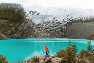 Hike by lake in mountains, Patagonia, Argentina