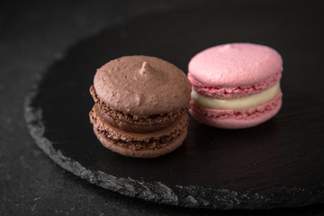 Colorful macarons cakes. Small French desert. Assorted Confectionery Range.