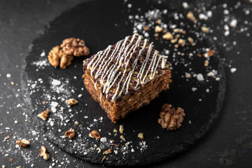 Cake made of honey, biscuit and walnut. Assorted Confectionery Range.