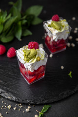 Mini dessert from fruit berry jelly, gentle mousse. Candy bar. Assortment of confectionery.