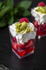 Mini dessert from fruit berry jelly, gentle mousse. Candy bar. Assortment of confectionery.