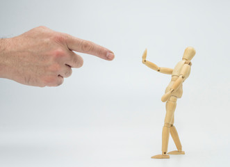 Hand drew a doll of wood, isolated on white background, conceptual image