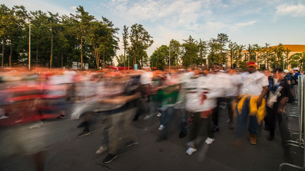 Obraz premium Spectators and football fans out of the stadium after the match,