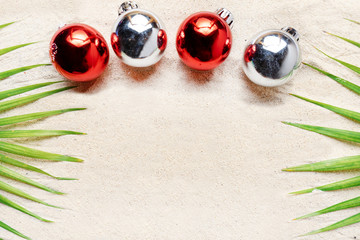 Christmas spheres on the beach