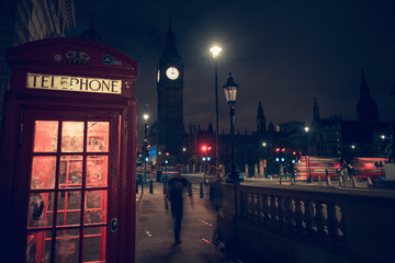 Fototapeta na wymiar Telephone booth near Houses of Parliament, London, UK