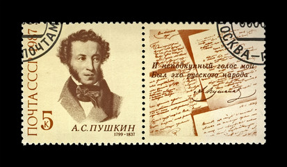 Pushkin Alexander (1799-1837),  famous russian  poet, verse writer, circa 1987. canceled vintage postal stamp printed in the USSR isolated on black background.
