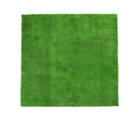 Artificial grass carpet on white background, top view. Exterior element