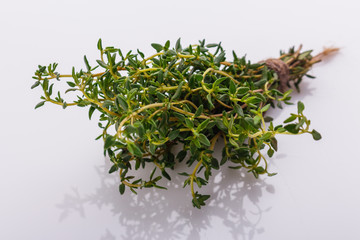 essential oil of thyme on a white background
