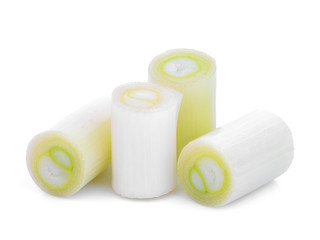 sliced japanese bunching onion isolated on white background