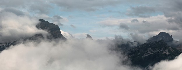 Mountain Peaks And Clouds