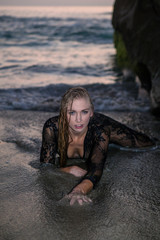 beautiful blond by the sea shore