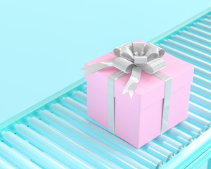 Pink gift box on conveyor roller.