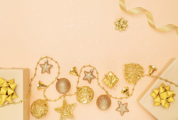 gifts boxes or presents boxes with golden bows, star and ball on golden background for birthday, christmas or wedding ceremony