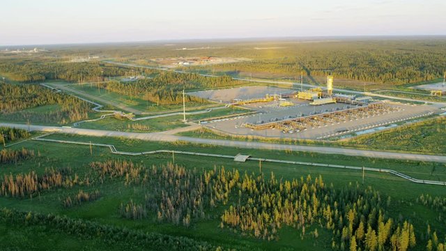 Sunset aerial view oil refinery Athabasca tar sands