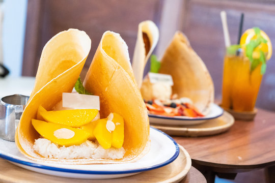 mango sticky rice crepe with ice cream picture vintage style
