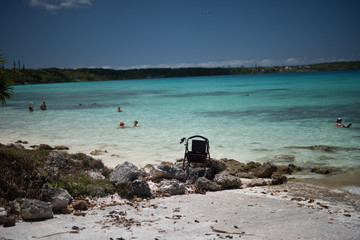 Wheel chair on beach