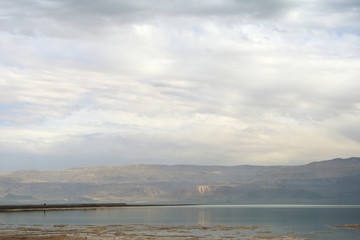 Obraz premium Dead Sea and overcast sky in cloudy weather