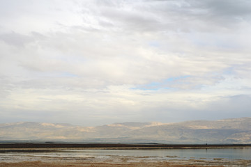Dead Sea and overcast sky in cloudy weather