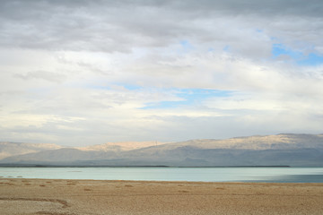 Dead Sea and overcast sky in cloudy weather