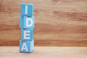 idea word made by letter wooden block business concept - obrazy, fototapety, plakaty