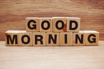 good morning wooden letter alphabet on wooden background