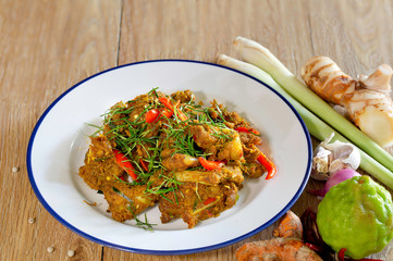 Stir fried cartilage pork with spicy curry paste (Thai call *Kua Kling*) thai food, in white dish