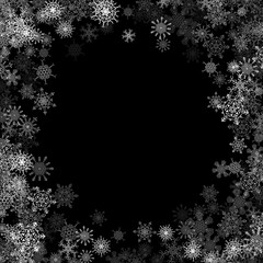 Fototapeta premium Snowfall with random snowflakes in the dark