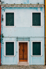 Fototapeta na wymiar Blue house in Burano, Venice, Italy