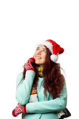 Photo of brunette in santa cap looking upwards