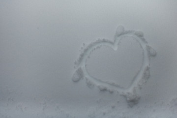 in the park in the snow painted heart