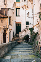 Fototapeta na wymiar A narrow staircase in Minori, on the Amalfi Coast in Campania, Italy