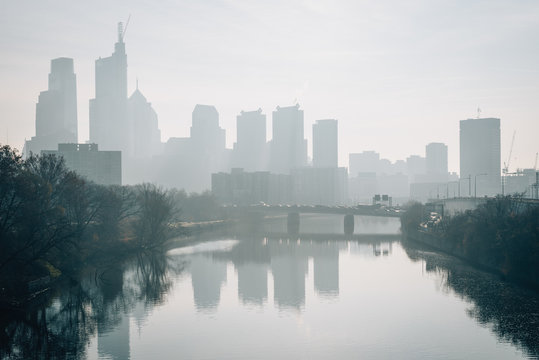 The Philadelphia skyline in fog and Schuylkill River in Philadelphia, Pennsylvania.