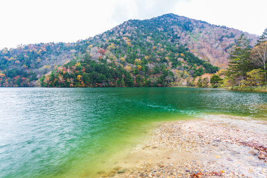 View of Yuno Lake in autumn season at Nikko national park, Nikko, Japan.