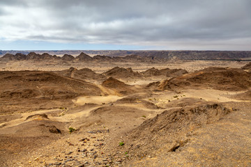 Fototapeta na wymiar Moon Landscape, an area of the Namib Desert on the Namibian Skeleton coast that looks like the moon.