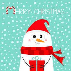 Merry Christmas. Snowman holding gift box present. Carrot nose, red Santa hat, scarf. Happy New Year. Cute cartoon funny kawaii character. Blue snow winter background. Flat design.