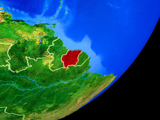 Suriname on planet Earth with country borders and highly detailed planet surface.