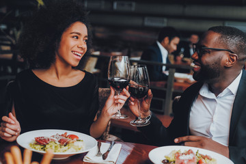 African American Couple Dating in Restaurant