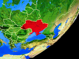 Ukraine on planet Earth with country borders and highly detailed planet surface.