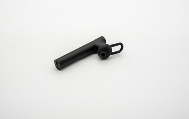 Black handsfree bluetooth receiver, isolated on a white