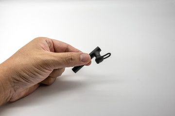 Black handsfree bluetooth receiver, isolated on a white
