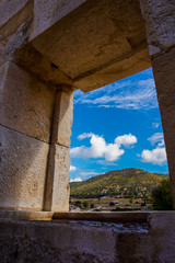 Mountain view from window detail of  Building of Patara Bouleuterion  in Kas, Antalya, Turkey.