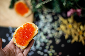 new year's appetizer,caviar on bread.