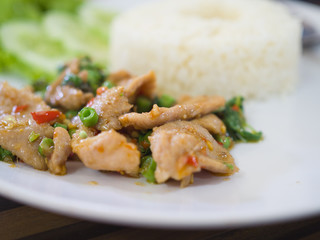 Close up of stir-fried pork and basil with rice, Thai spicy food basil pork fried rice recipe (Krapao Moo)