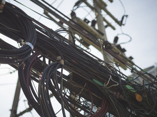 Close up of tangled electrical wires are dangerous