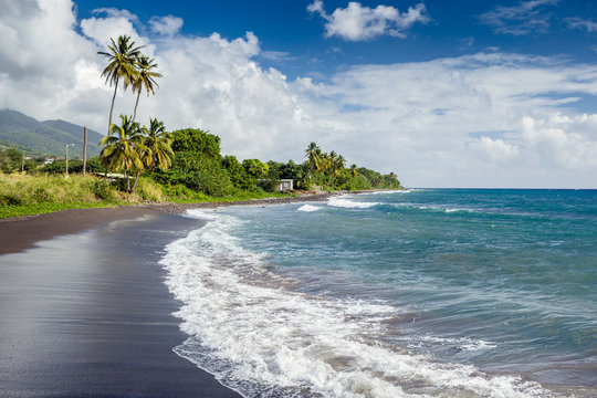 Beach on a St. Kitts island with black sand