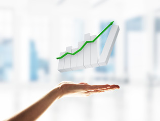 Concept of financial growth and progress by increasing arrow in palm